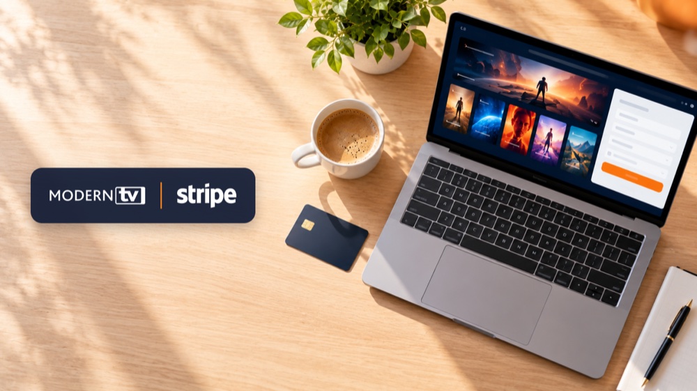 Laptop on a sunny desk showing a streaming service web page with an order form, a payment card next to it, and the ModernTV and Stripe logos